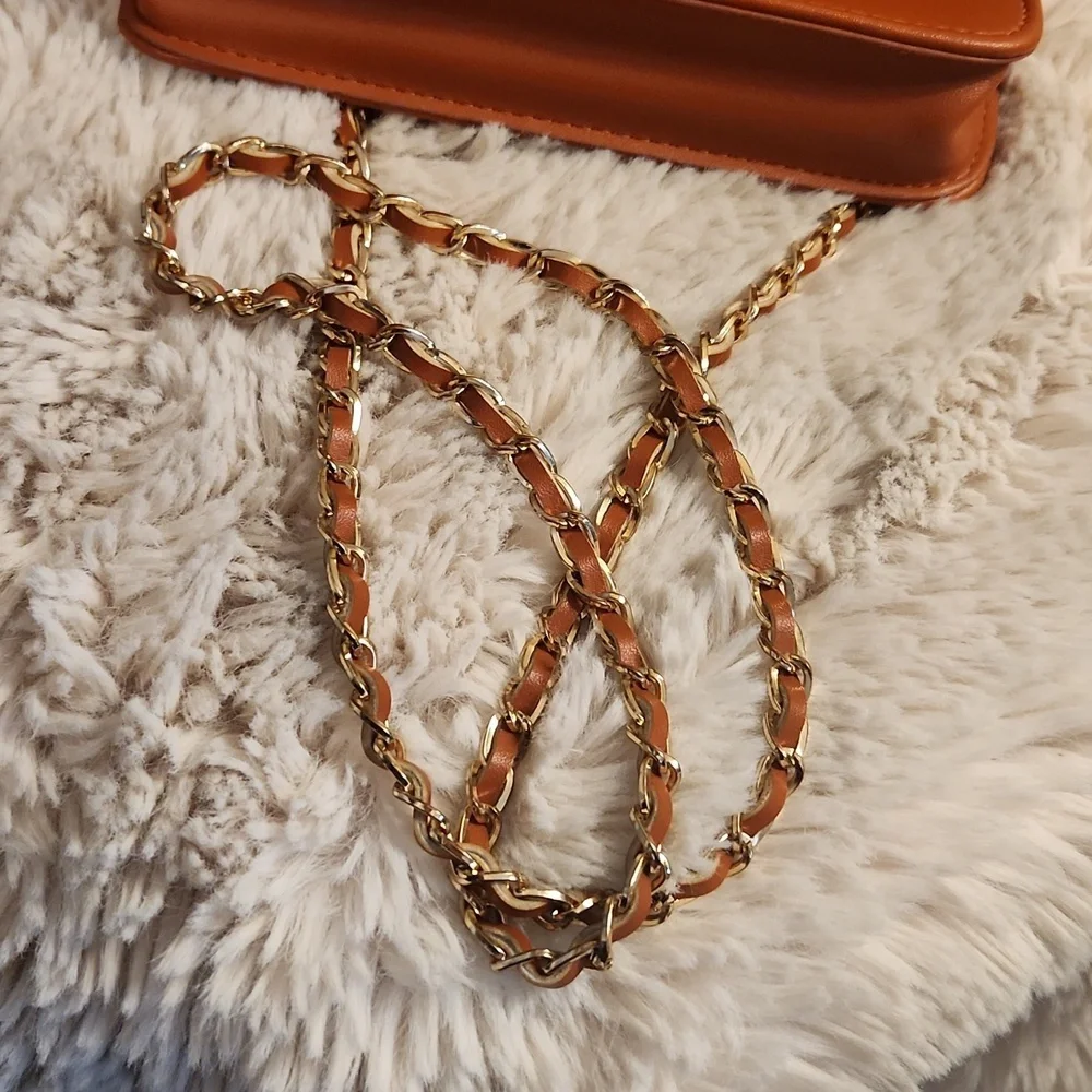 Bebe quilted bag with Gold rope chain cross body bag. Gently Used - Picture 16 of 16